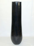 Palmenvase aus ausgehöhltem Palmenstamm in schwarz