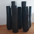 Palmenvase aus ausgehöhltem Palmenstamm in schwarz